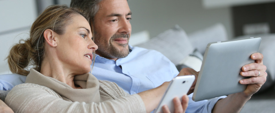 Couple using tablet