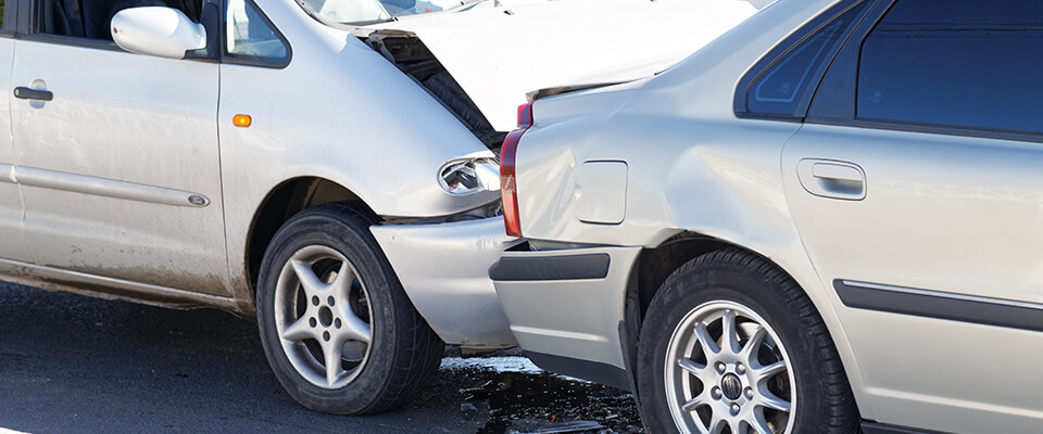 Closeup of two cars in an accident