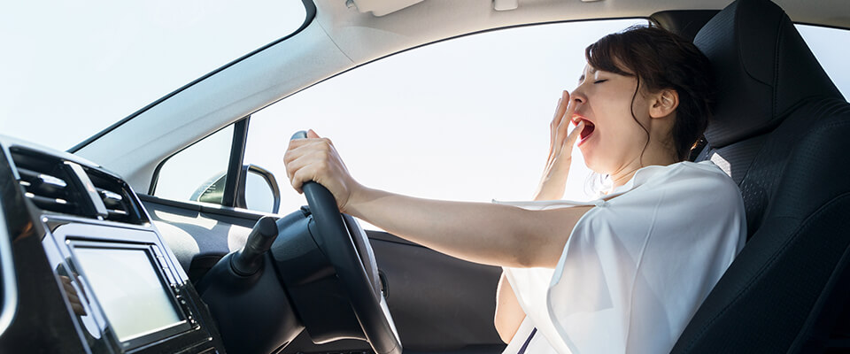 Yawning woman driver