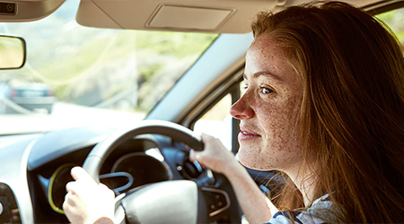 Young woman driving