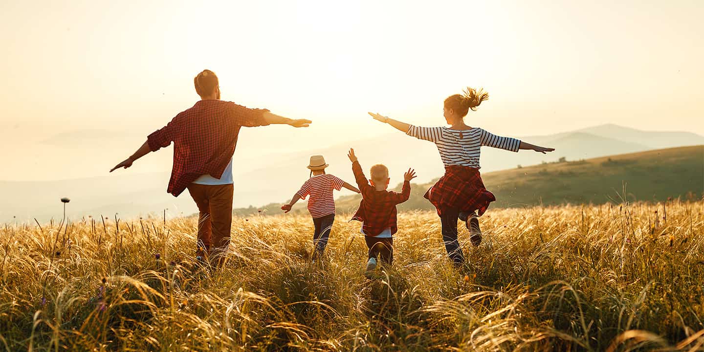Happy family after getting their AXA Plus discounts