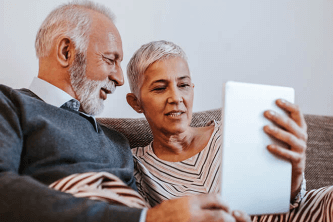 Eldery couple using tablet